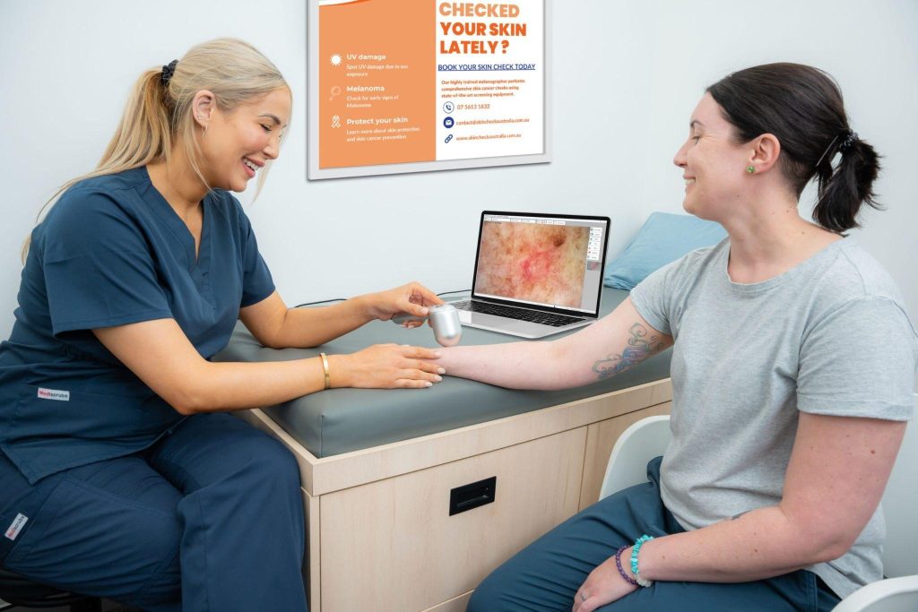 dermatologist performing skin check on patient